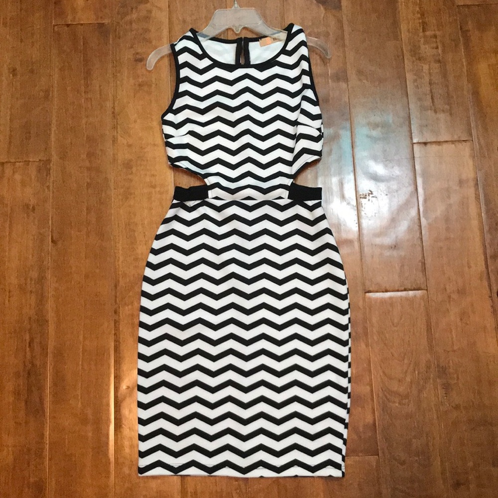 Black/white striped mid-length dress w/ open sided